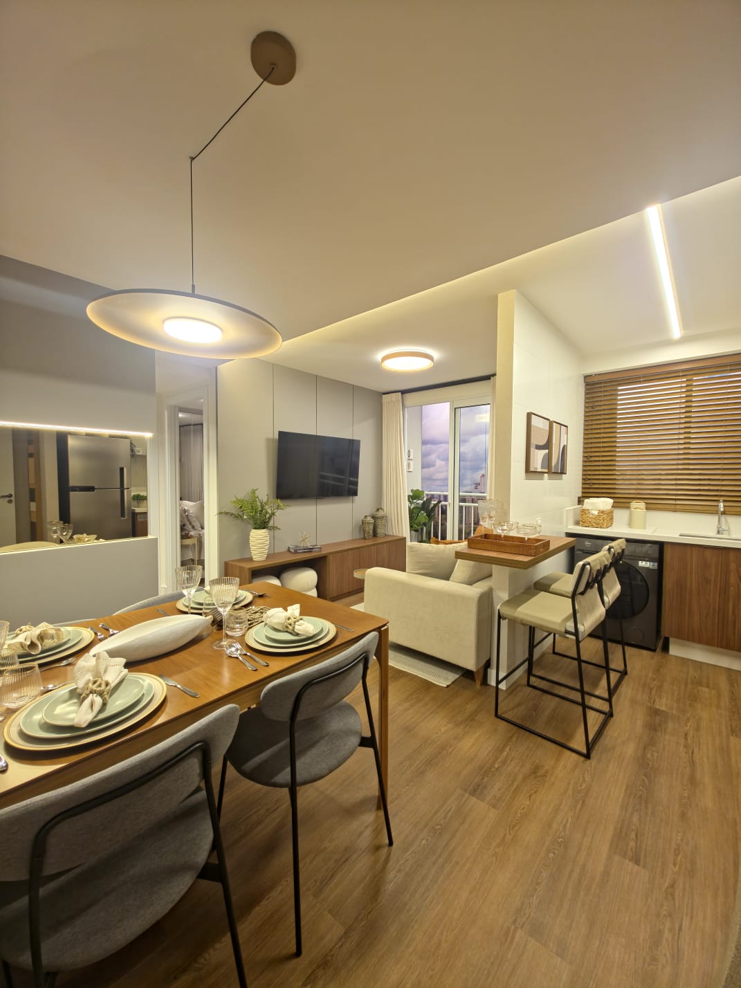 Sala de estar e mesa de jantar - Singulare Home Riva